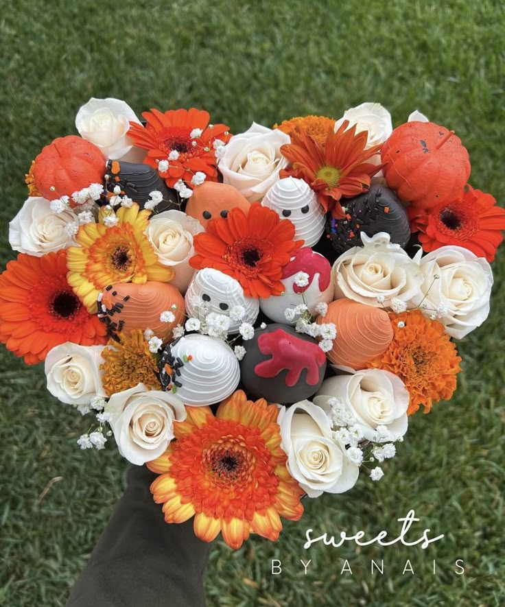 Bouquet of flowers with decorative elements on a grass background